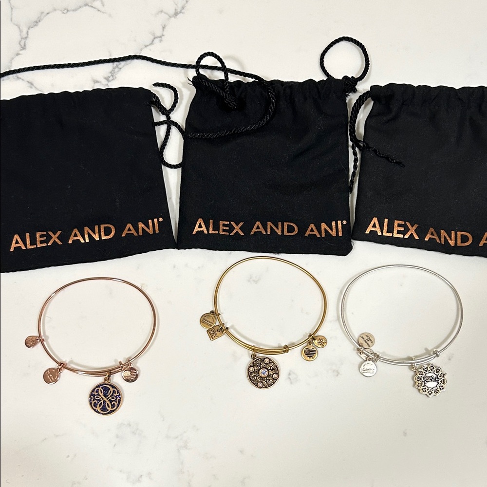 Three brackets sold together. Alex and Ani Trio Charm Bangles in Mixed Metals